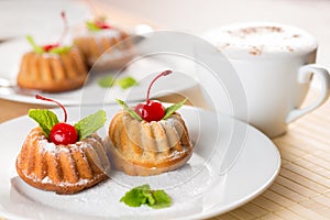 Fancy cakes dessert with cappuccino coffee