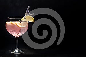 Fancy cocktail with fresh fruit. Gin and tonic drink with ice at a party