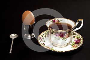 Fancy coffee cup and egg