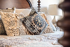 Decorative pillows on bed