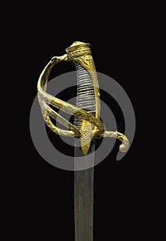 Fancy gold sword hilt isolated. photo