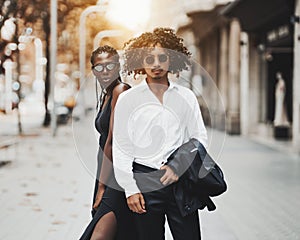 Fancy interracial couple on a street of Barcelona