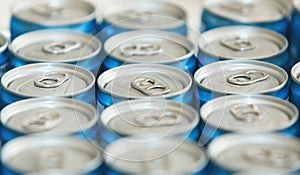 Fancy metal cans with refreshing drinks, in macro picture.