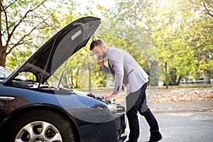 Fancy new car broke down leaving a poor guy stranded on his way to work