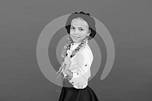 Fancy style. Little girl with braids ready for school. Do you speak french. School fashion concept. Schoolgirl wear