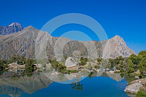 Fann mountains turquoise crystal clear lake