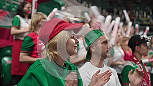 Fans crowd claps at football stadium. Soccer sport cheer tribune. Couple applaud