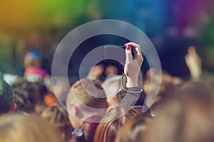 Fans Photographing Music Band Live Performing on Stage