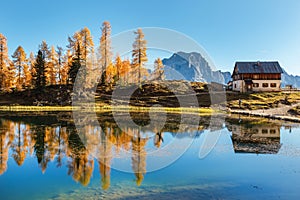 Fantastic autumn landscape. The view on Federa Lake at autumn. Dolomites, Cortina DAmpezzo, South Tyrol