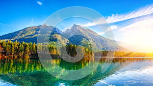 Fantastic autumn sunrise of Hintersee lake