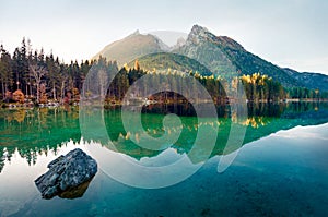 Fantastic autumn sunrise of Hintersee lake. Amazing morning view of Bavarian Alps on the Austrian border, Germany, Europe.