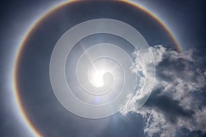 Fantastic beautiful sun halo phenomenon. Serenity nature.