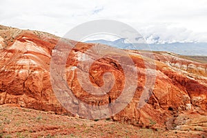 Fantastic clay castles in the sandy desert of the red canyon