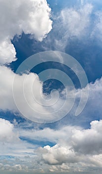 Fantastic clouds against blue sky, panorama