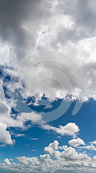 Fantastic clouds against blue sky, panorama