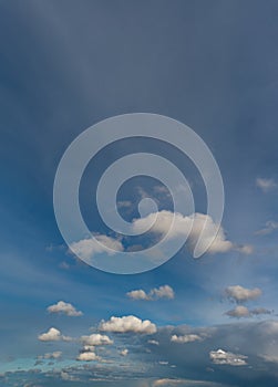 Fantastic clouds at sunrise, vertical panorama