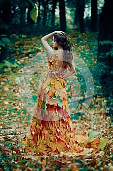 Fantastic girl in the autumn forest