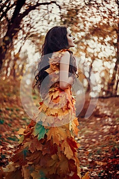 Fantastic girl in the autumn forest