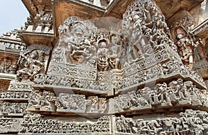 Fantastic Indian architecture in ancient temples of Halebidu, with carved Narasimha Lord and other Hindu gods, India.