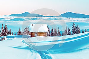 Fantastic landscape with snowy house