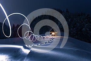 Fantastic landscape with snowy house