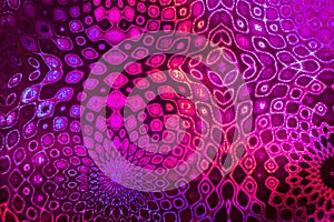 Fantastic ornate pink-violet pattern on holographic paper.