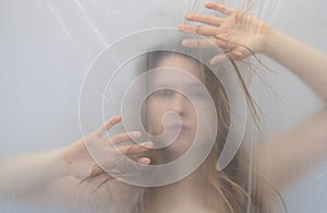 Fantastic outstanding strange portrait with protective defensive hands in anxiety dream of beautiful sexy sensual woman behind