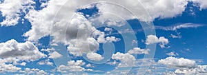 Fantastic panoramic white clouds against blue sky