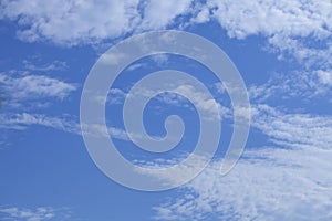 Fantastic soft white clouds against blue sky