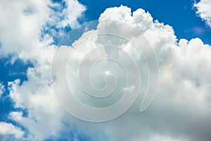 Fantastic soft white clouds against blue sky background