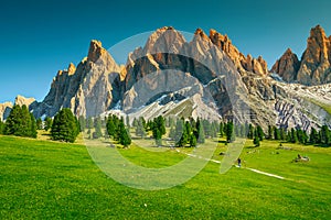 Fantastic summer alpine landscape with high cliffs, Dolomites, Italy photo