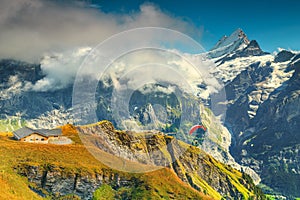 Fantastic summer holiday resort with high snowy mountains, Grindelwald, Switzerland