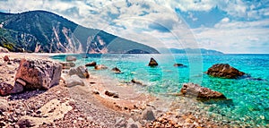 Fantastic summer view of Myrtos Beach. Panoramic morning scene of Cephalonia island, Divarata village location, Greece, Europe. Ex