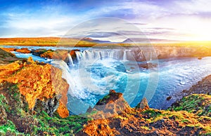 Fantastic sunrise scene of powerful Godafoss waterfall