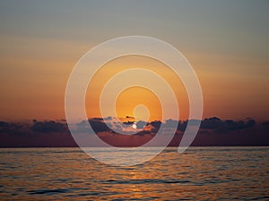 Fantastic Sunset on the Ocean. Nspirational Calm Sea with Sunset sky. Meditation Ocean and Sky Background. Colorful Horizon