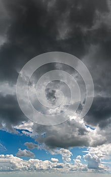 Fantastic thunderclouds, vertical panorama