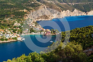 Fantastic top view at Asos village, Assos peninsula and blue Ionian Sea water. Aerial view, summer scenery of famous and