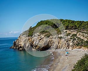 Fantastic view of the famous beach called \'Home Mort Beach\' of Sitges, Spain in a sunny spring day