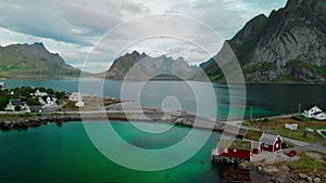 Fantastic view of fjord and small bridge against mountains