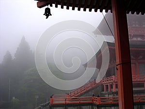 Fantastic view of a Shinto shrine in the Japanese mountains photo