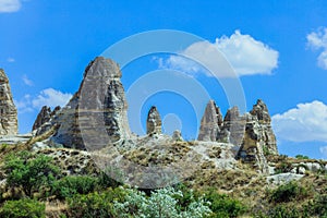 Fantastic View to the GÃ¶reme with rock houses in front of the spectacularly coloured valleys nearby,