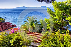 Fantastic views of the adriatic sea under sunlight and blue sky.