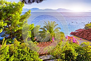 Fantastic views of the adriatic sea under sunlight and blue sky.