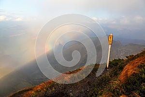 Fantastic views of the mountains and the colorful phenomenon Brocken Spectre.