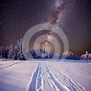 Fantastic winter meteor shower and the snow-capped mountains