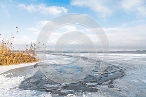 Fantastic winter river landscape. colorful sky glowing by sunlig