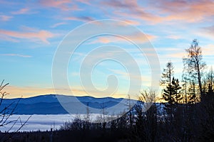 Fantastical sunset scenery over foothills.