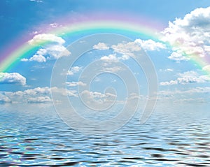 Fantasy of a blue sky and rainbow with cumulus clo