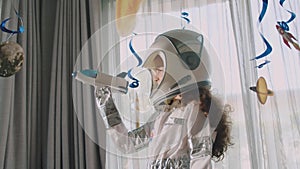 Fantasy child astronaut flying in spaceship.Spacewoman form of space hero in suit bumblebee astronaut conquers space in