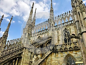 Fantasy city - Rooftops of Duomo Cathedral, Milan, Italy.